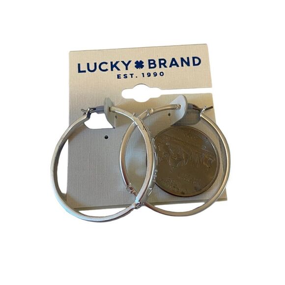 Matte Silver Toned Embossed “Love” Hoop Earrings. - Picture 6 of 6